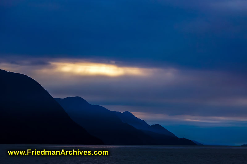 nature,dusk,dawn,blue,mountains,clouds,smoke,water,horizon,boating,canoeing,scenic,landscape,